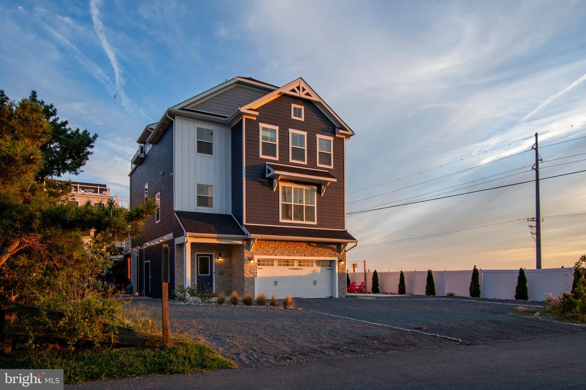 39546 Admiral Road Bethany Beach, DE 19930 - Photo 62 of 73 a front view of a house with a yard