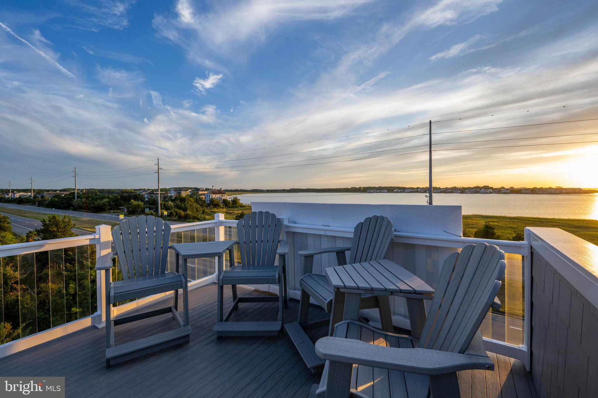 39546 Admiral Road Bethany Beach, DE 19930 - Photo 65 of 73 a terrace of a house with outdoor seating