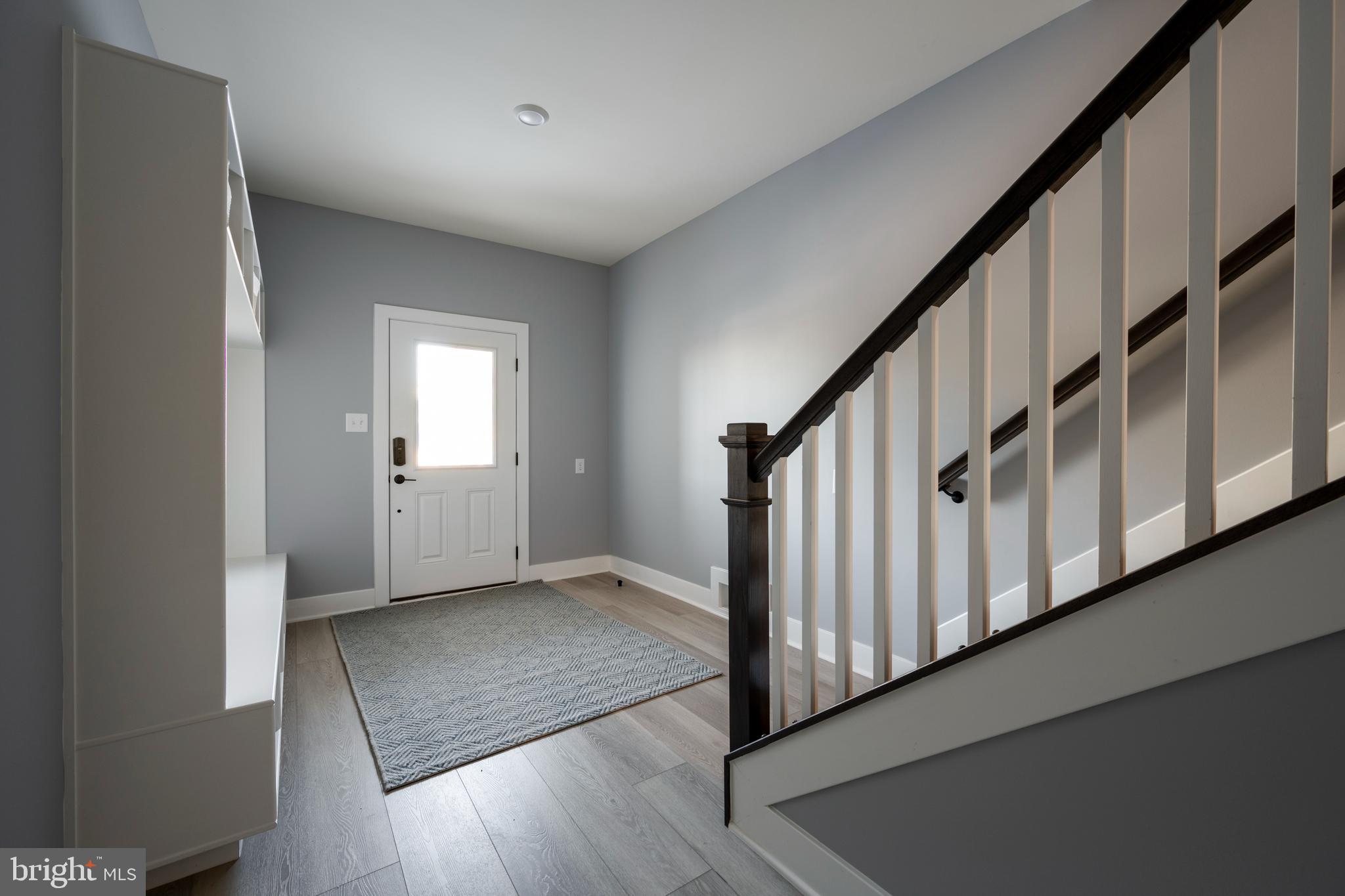 39546 Admiral Road Bethany Beach, DE 19930 - Photo 10 of 73 a view of an entryway with wooden floor