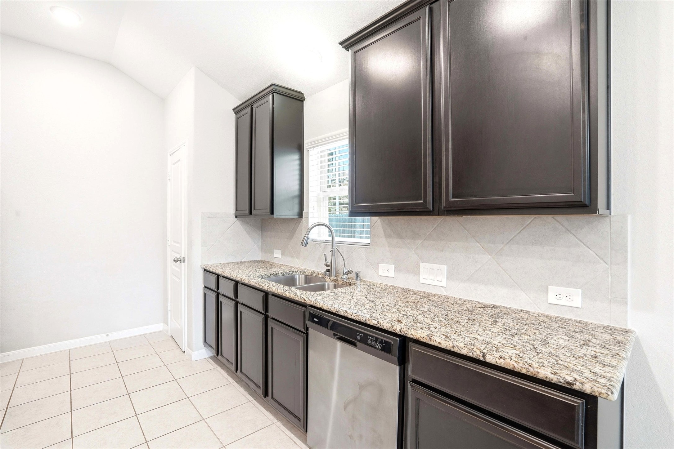 3718 Logandale Ridge Lane Katy, TX 77493 - Photo 9 of 28 Plenty of cabinets and separate pantry
