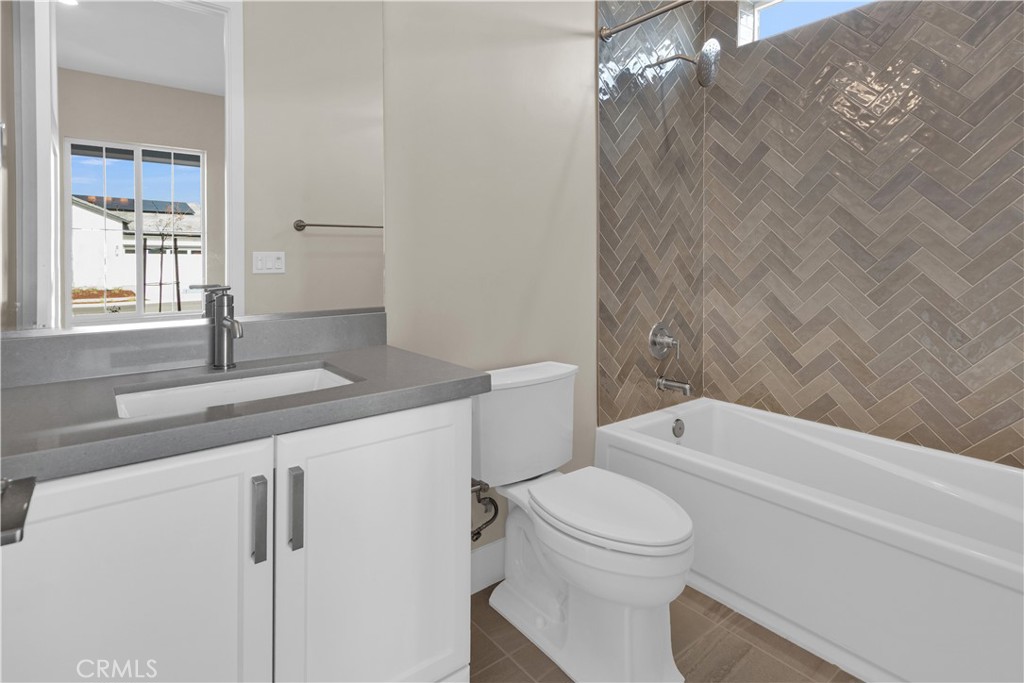 1324 Cava Road Paso Robles, CA 93446 - Photo 12 of 15 a bathroom with a sink a toilet and shower