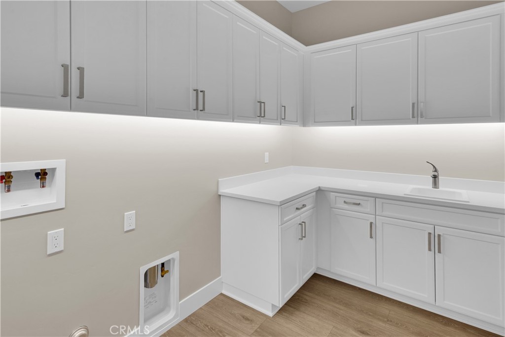 1324 Cava Road Paso Robles, CA 93446 - Photo 13 of 15 a bathroom with a sink and cabinets