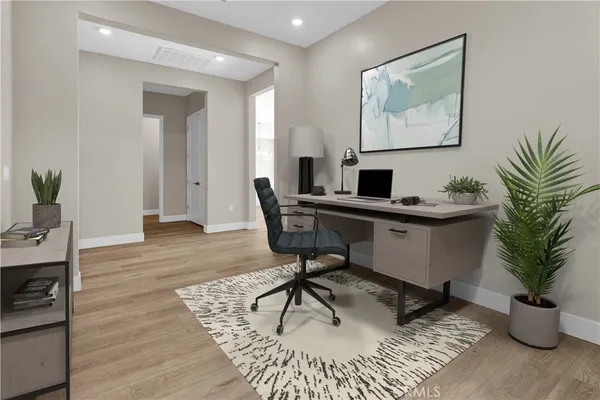 a workspace with furniture and window