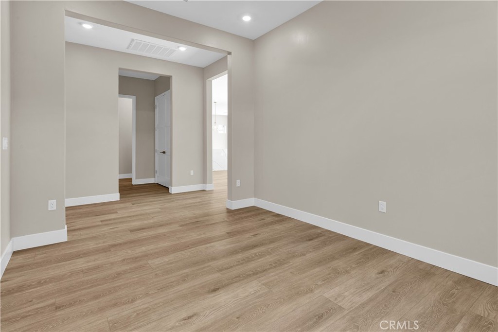 1324 Cava Road Paso Robles, CA 93446 - Photo 6 of 15 a view of an empty room and wooden floor