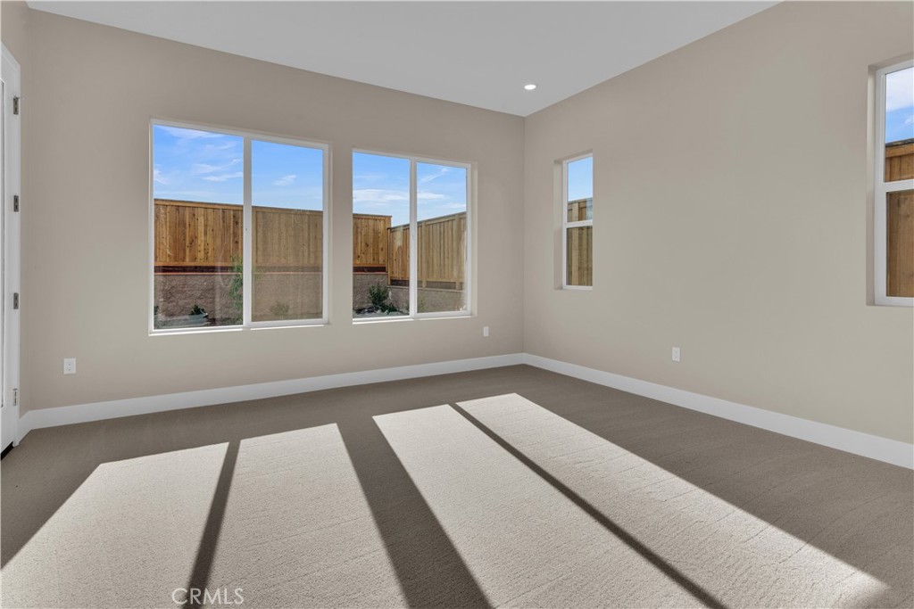 1324 Cava Road Paso Robles, CA 93446 - Photo 9 of 15 a view of a bedroom with wooden floor and windows