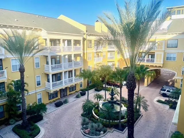 a view of a building with a swimming pool