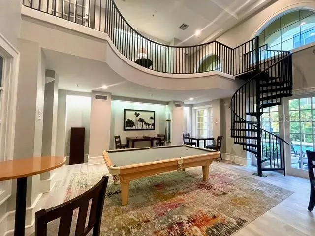 an aerial view of residential house with parking