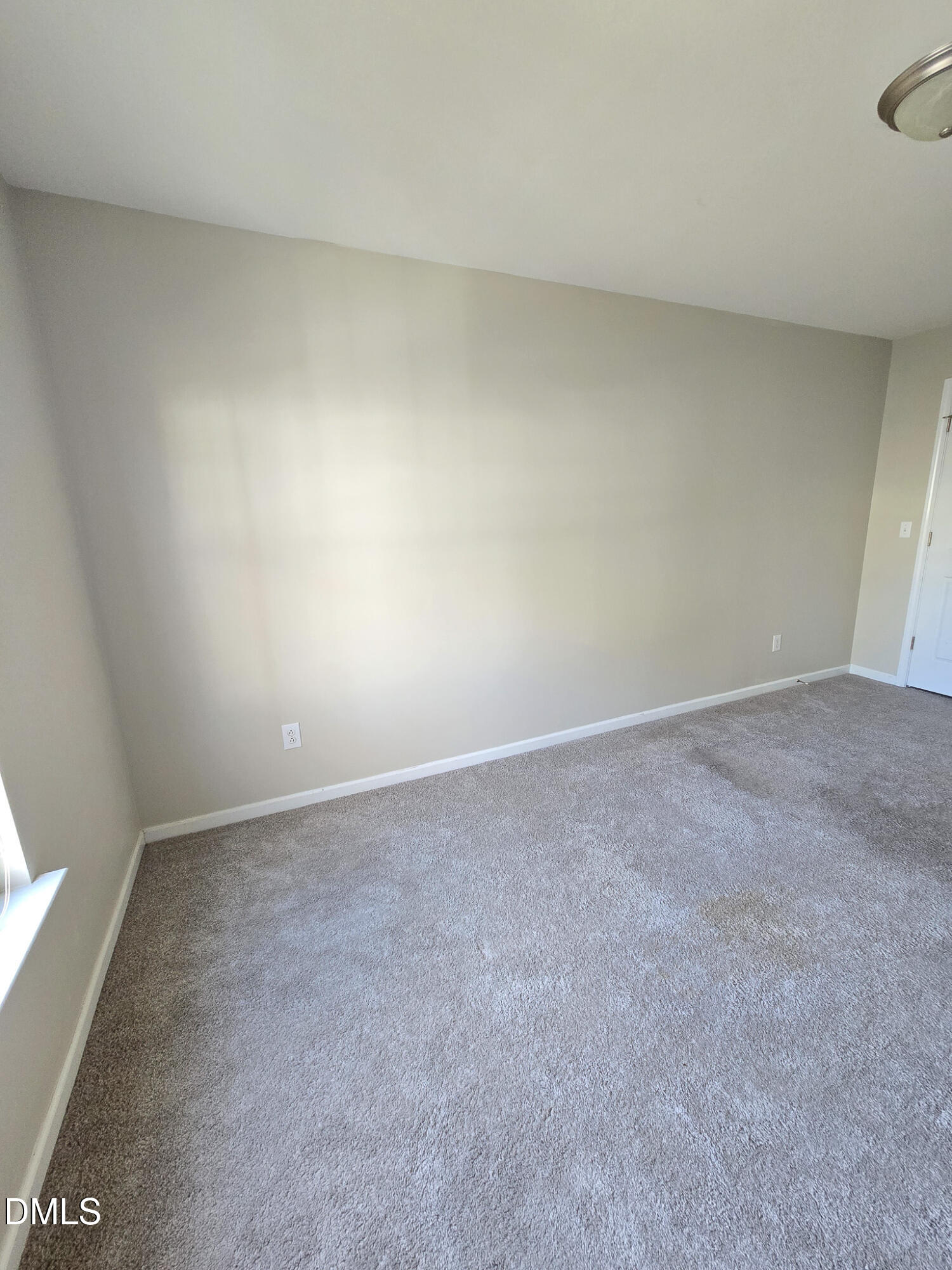 8641 Neuse Club Lane Raleigh, NC 27616 - Photo 23 of 35 a view of an empty room and window