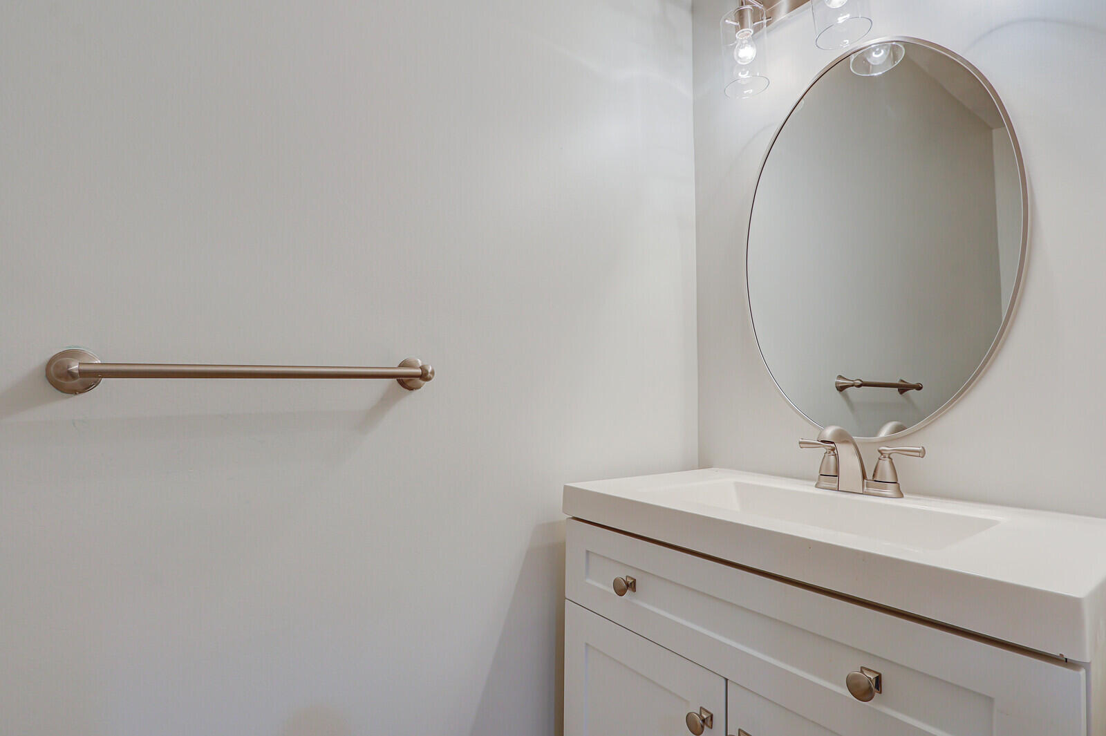 6148 Southeast Georgetown Place, Unit 805 Hobe Sound, FL 33455 - Photo 10 of 44 a bathroom with a sink and a mirror