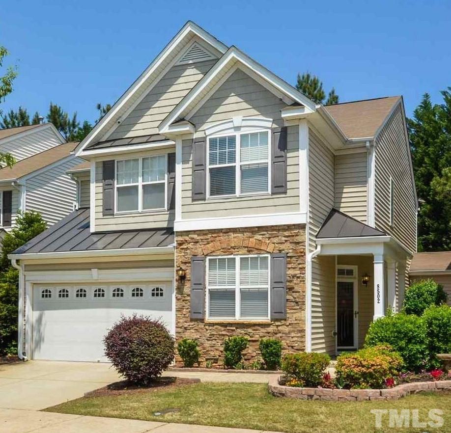 8502 Pillar Gate Lane Raleigh, NC 27613 - Photo 1 of 22 a front view of a house with garden