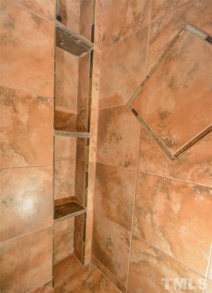 8502 Pillar Gate Lane Raleigh, NC 27613 - Photo 16 of 22 a bathroom with a shower