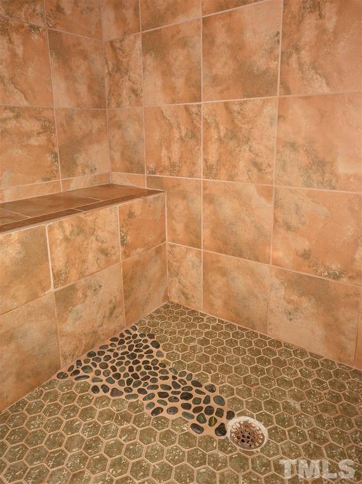 8502 Pillar Gate Lane Raleigh, NC 27613 - Photo 17 of 22 a bathroom with a shower