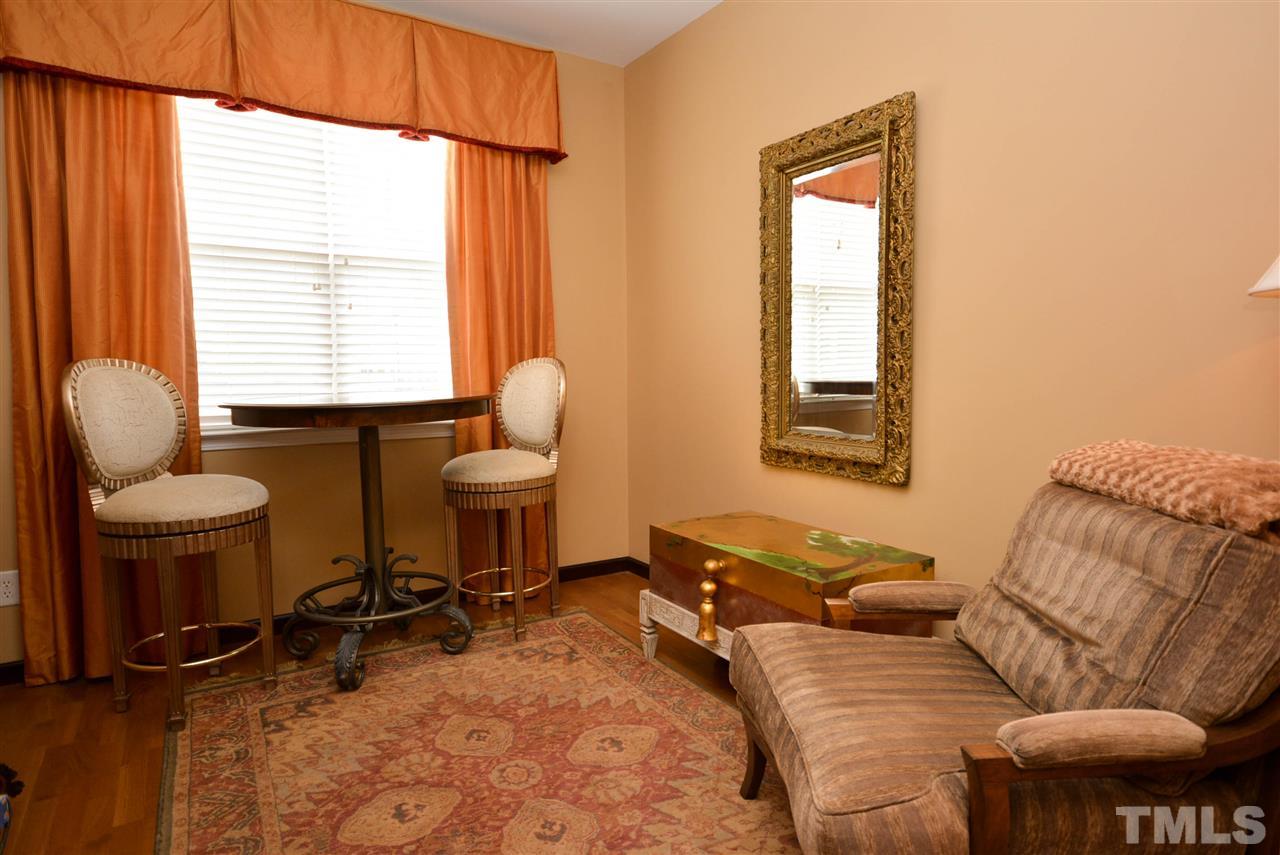 8502 Pillar Gate Lane Raleigh, NC 27613 - Photo 9 of 22 a living room with furniture a window and a table