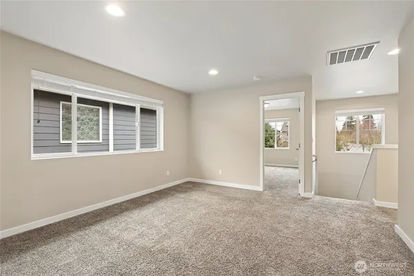 a view of empty room with front door