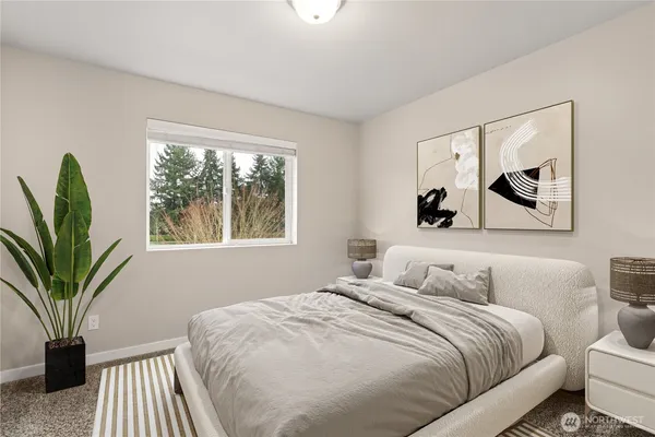 an empty room with closet and a bathroom