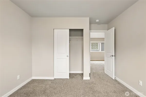 a workspace with furniture and window