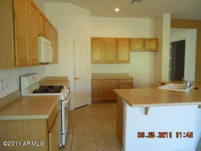 2018 North Pacey Road Phoenix, AZ 85037 - Photo 13 of 35 a utility room with washer and dryer