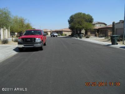 2018 North Pacey Road Phoenix, AZ 85037 - Photo 2 of 35 a car parked on the side of a street