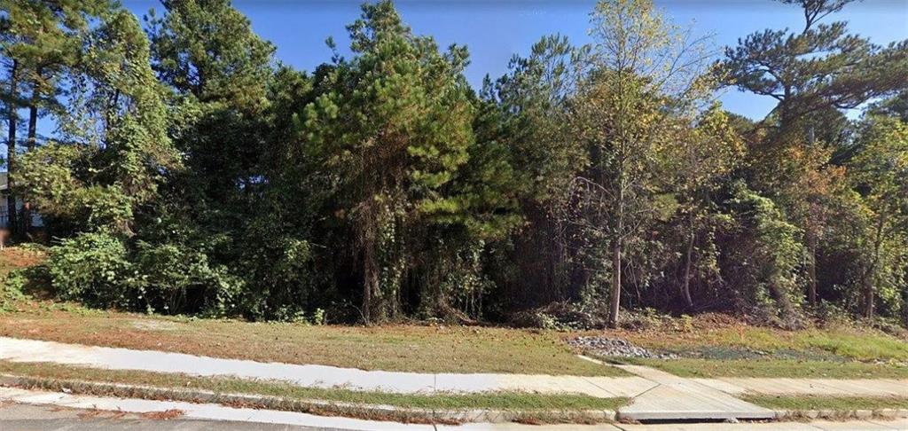 0 Harbins Road Northwest Norcross, GA 30093 - Photo 1 of 2 a view of a yard with plants and trees