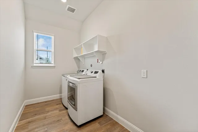 a utility room with dryer and washer