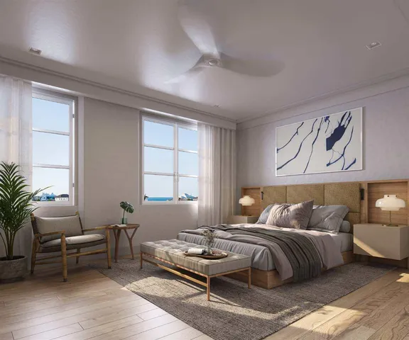 a bedroom with furniture and window