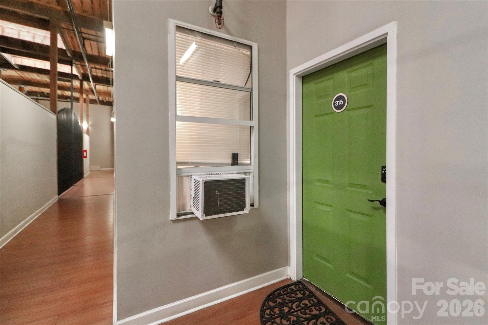 201 South Hoskins Road, Unit 315 Charlotte, NC 28208 - Photo 29 of 45 a bathroom with a sink a toilet and a shower