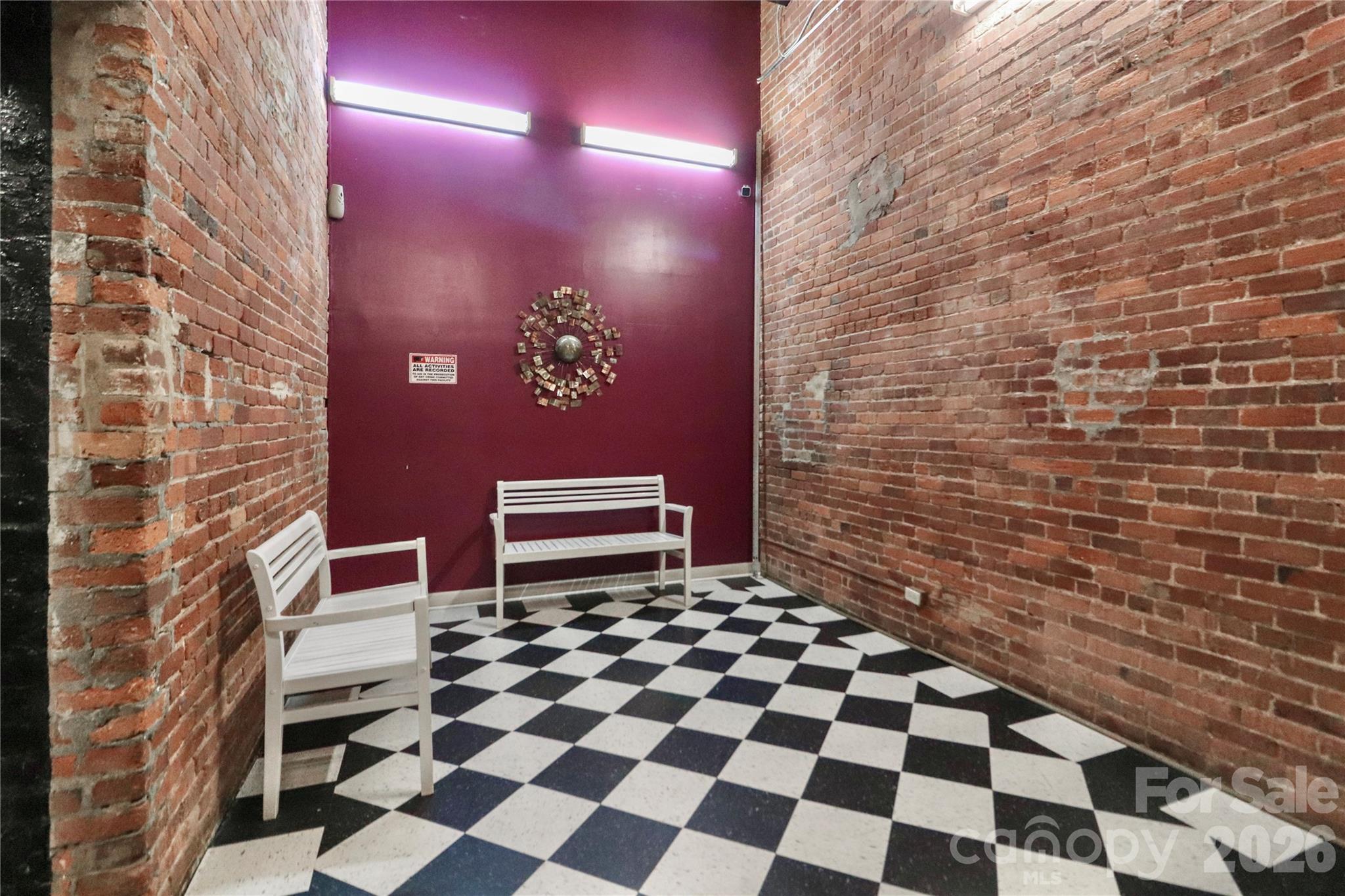 201 South Hoskins Road, Unit 315 Charlotte, NC 28208 - Photo 32 of 40 a bathroom with a black and white checkered floor
