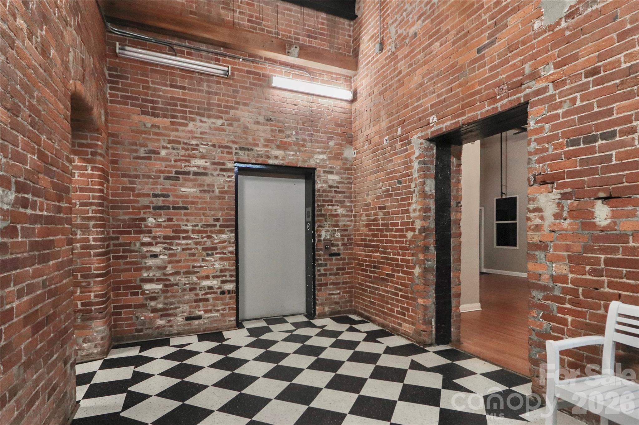 201 South Hoskins Road, Unit 315 Charlotte, NC 28208 - Photo 32 of 45 a view of a brick wall