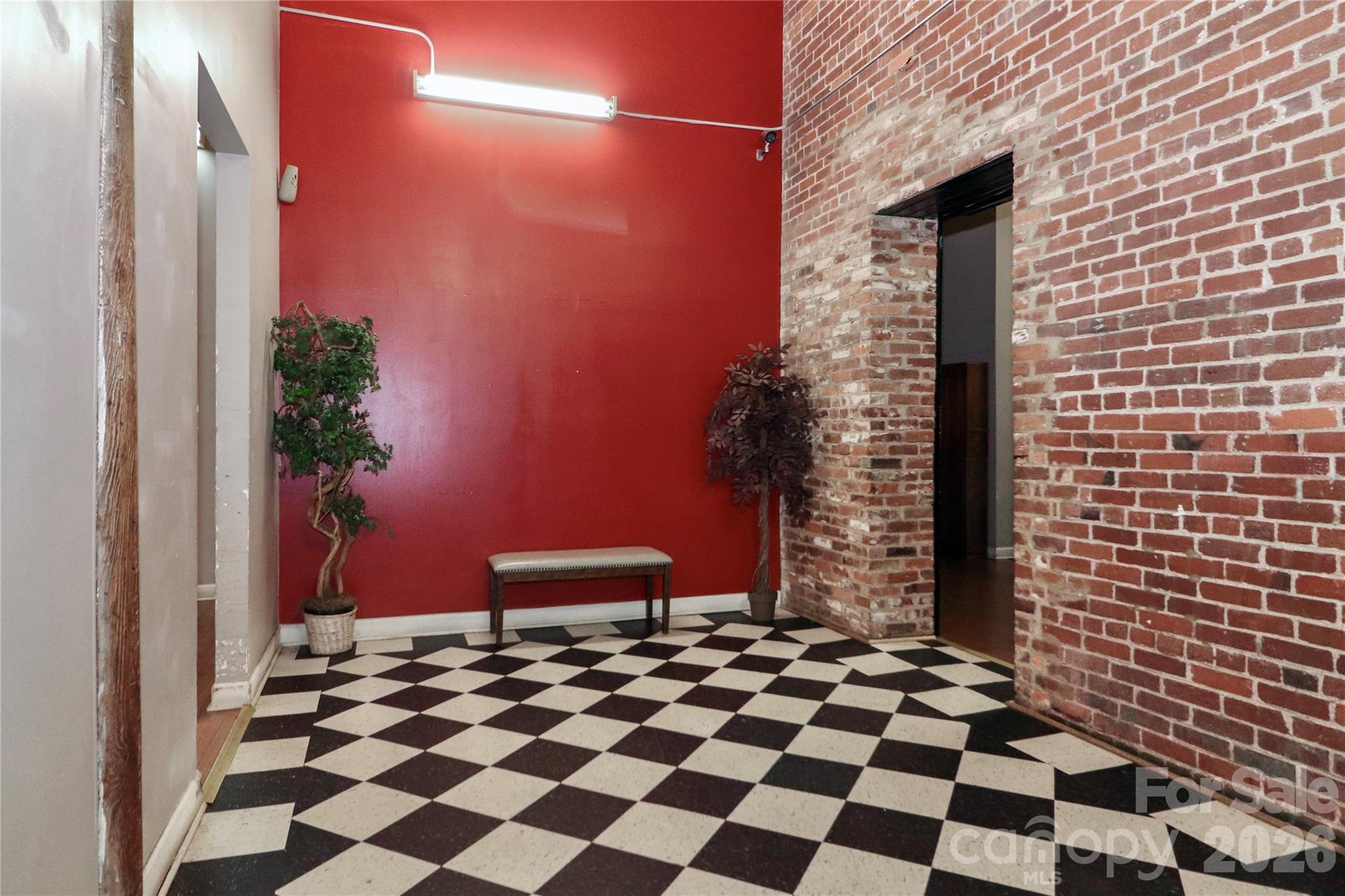 201 South Hoskins Road, Unit 315 Charlotte, NC 28208 - Photo 34 of 40 a black and white checkered floor