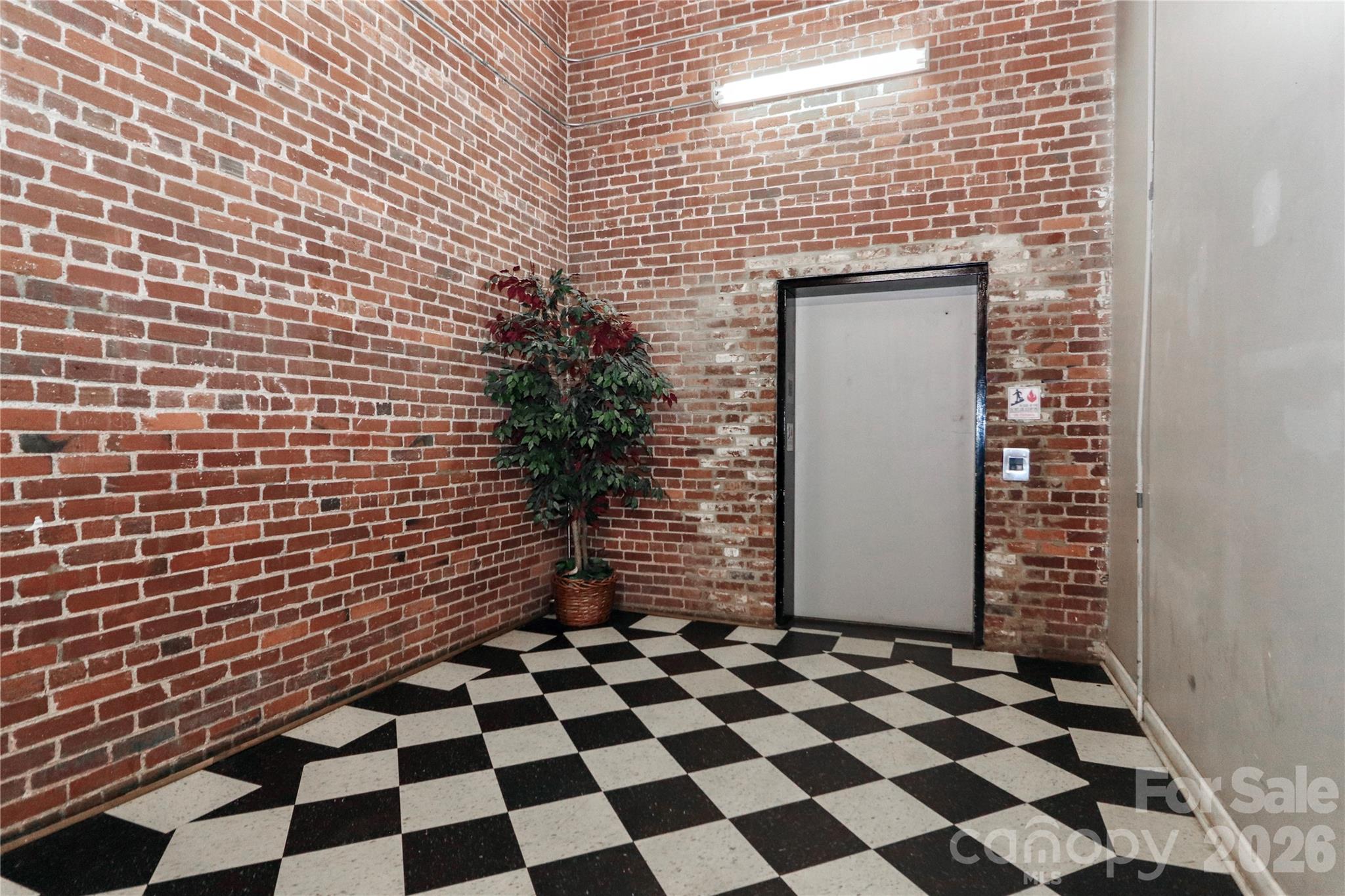201 South Hoskins Road, Unit 315 Charlotte, NC 28208 - Photo 34 of 45 a bathroom with a sink and a shower