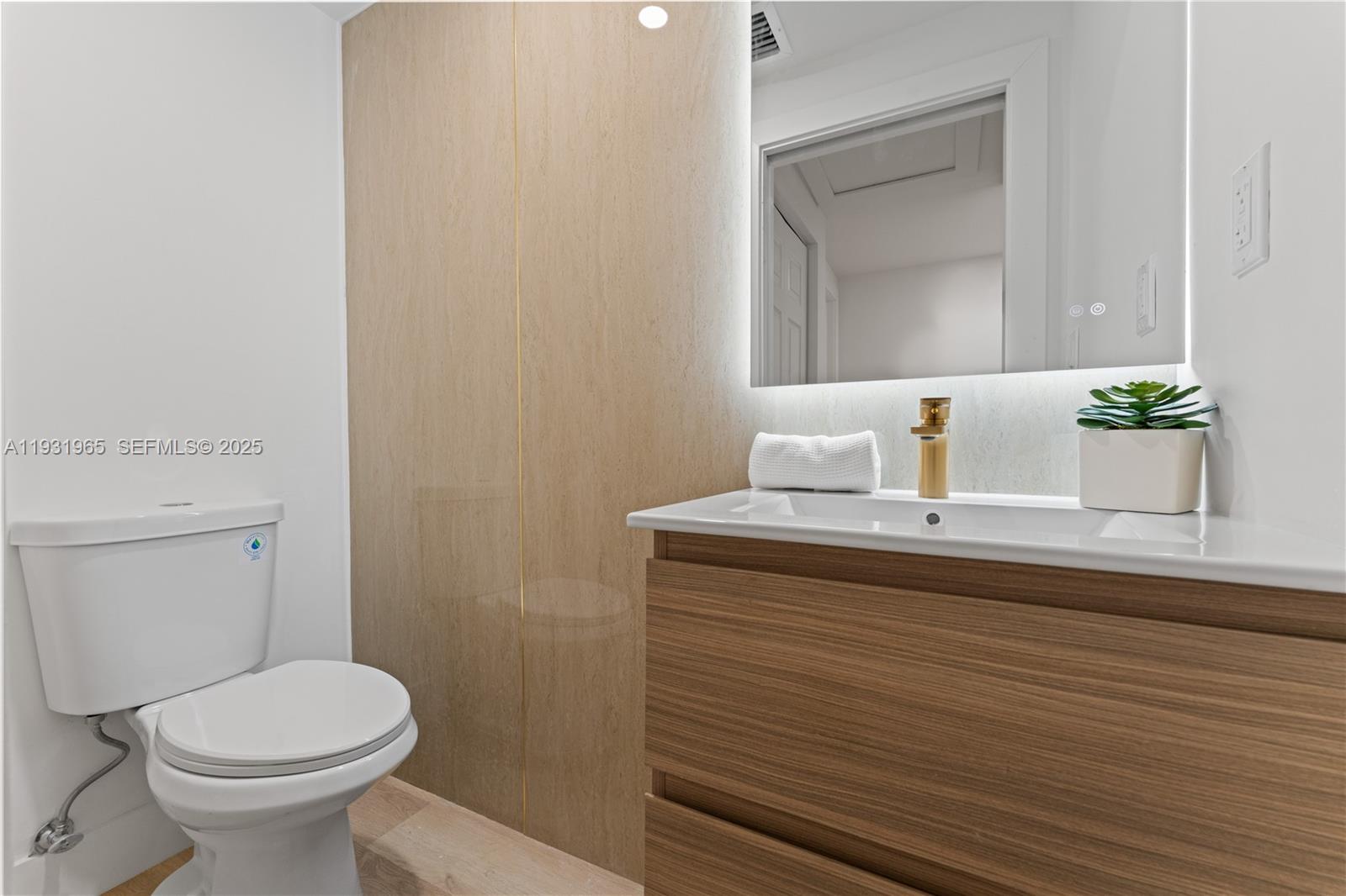 4555 Southwest 2nd Street Miami, FL 33134 - Photo 16 of 37 a bathroom with a sink and a toilet