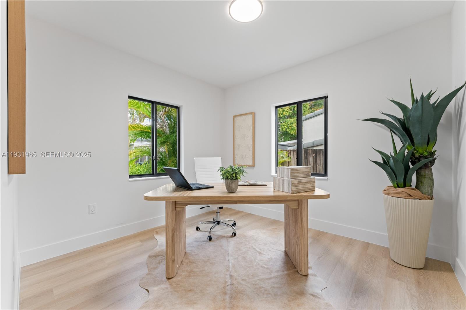 4555 Southwest 2nd Street Miami, FL 33134 - Photo 24 of 37 a dining room with furniture and a window