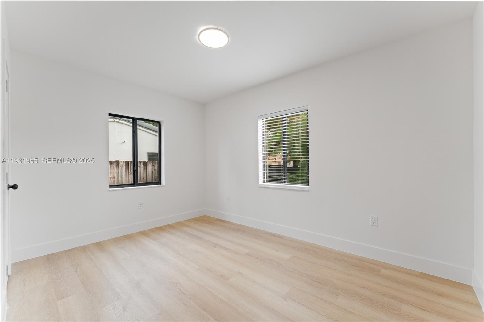 4555 Southwest 2nd Street Miami, FL 33134 - Photo 26 of 37 an empty room with a window