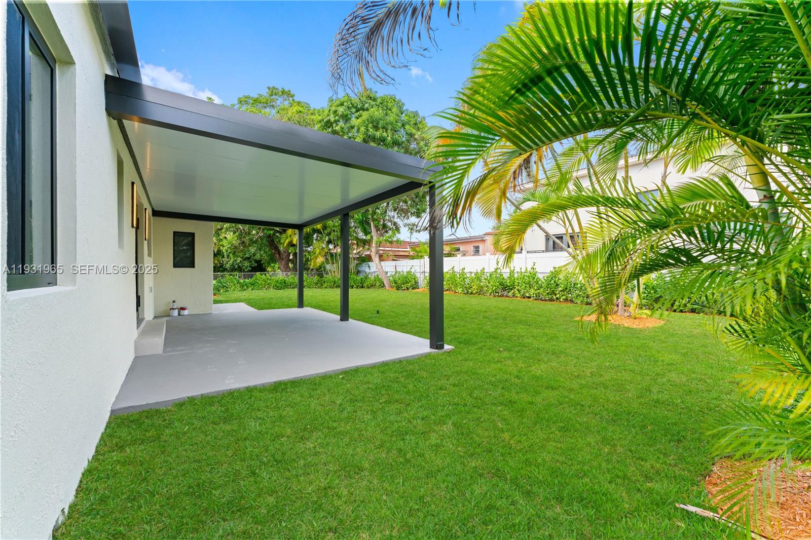 4555 Southwest 2nd Street Miami, FL 33134 - Photo 28 of 37 a view of a house with a backyard