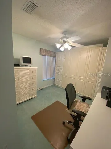 a room with furniture and a chair