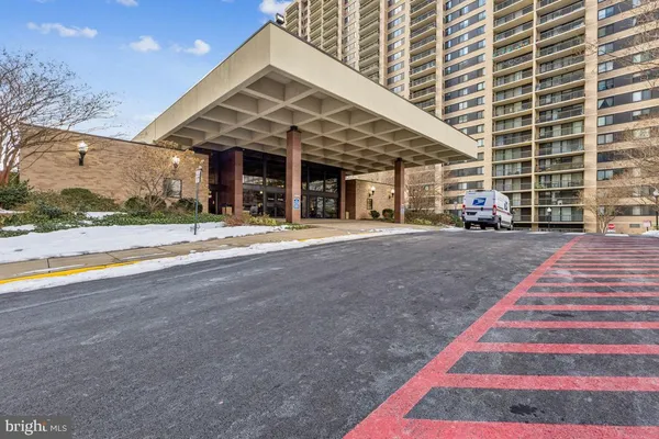 a view of a building with a patio