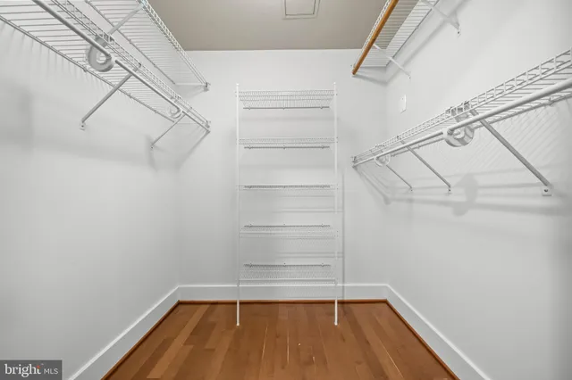 a view of a room with racks on the wall