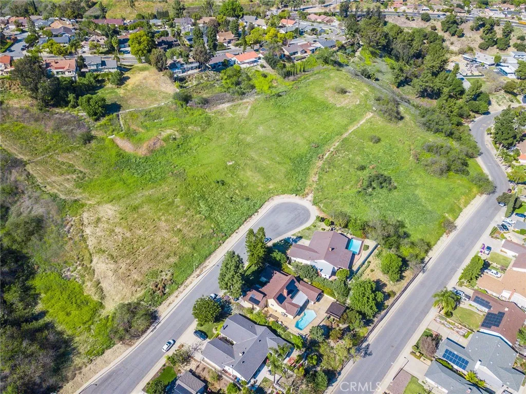 16 Camelback Drive Walnut, CA 91789 - Photo 7 of 23 an aerial view of swimming pool with a yard and mountain view in back