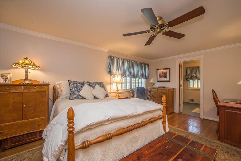 885 Old Hickory Road Mt. Lebanon, PA 15243 - Photo 12 of 25 The master bedroom measures an impressive 18x13 and offers oak hardwood floor, crown molding, ceiling fan, walk-in closet, and private bath. Windows overlook the back of the home. The room has been freshly painted.