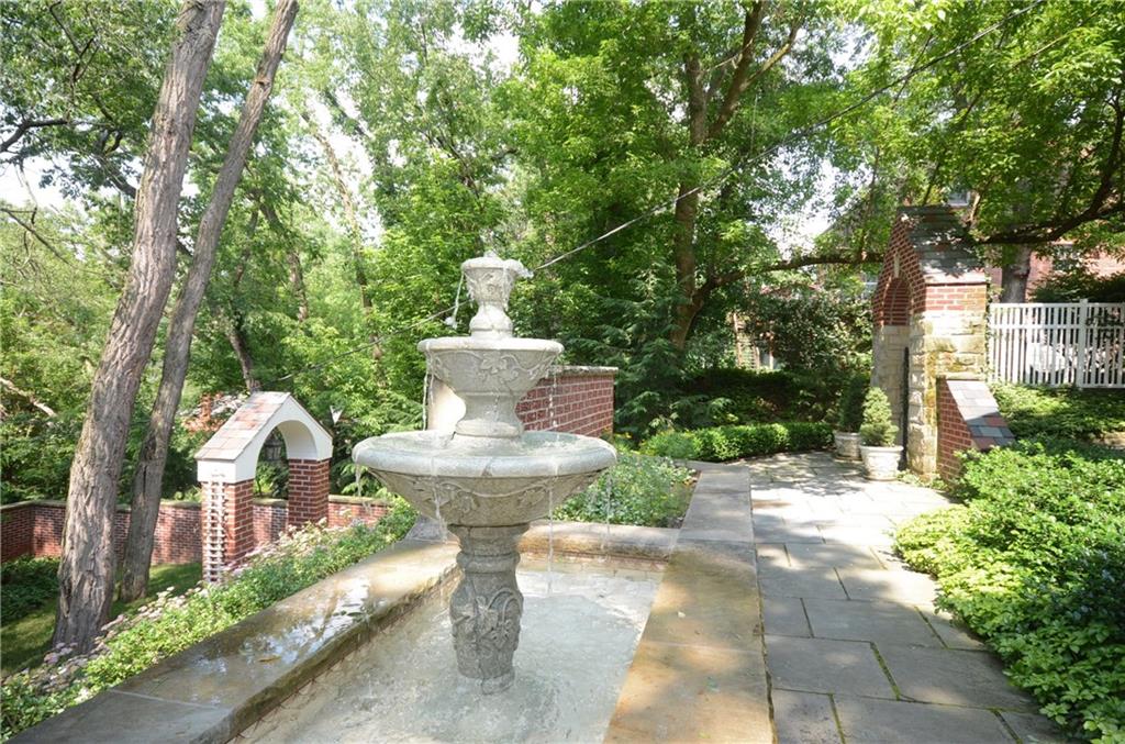 885 Old Hickory Road Mt. Lebanon, PA 15243 - Photo 23 of 25 The garden space extends the architecture of the home through the integration of brick structures and landscape features including arches and terraces. The design style is southern Colonial, with an enchanting fountain as a focal point.