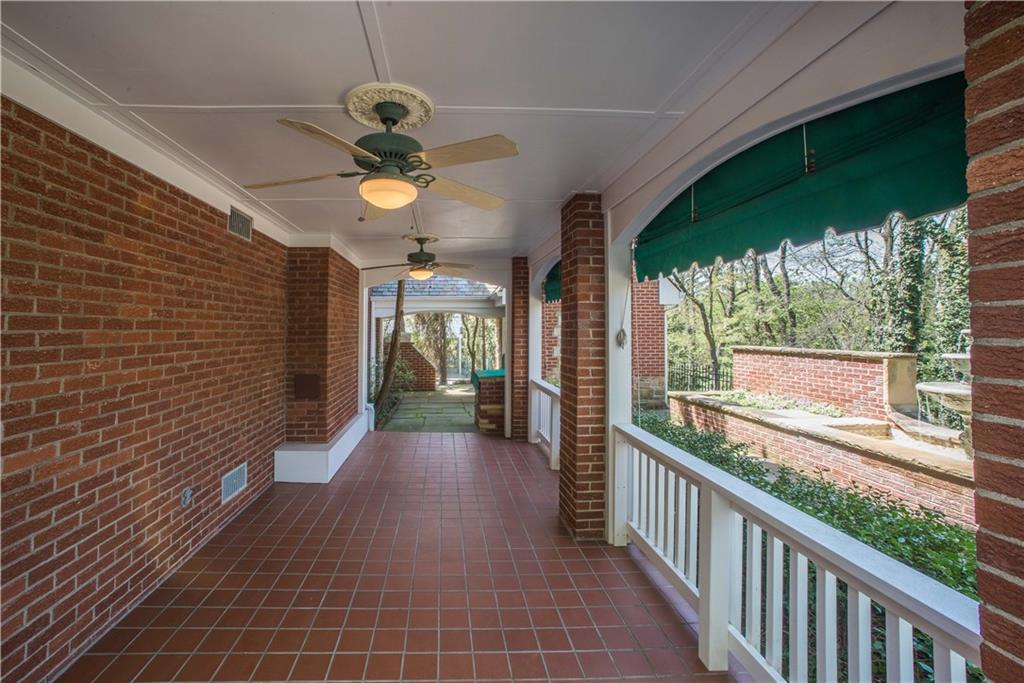 885 Old Hickory Road Mt. Lebanon, PA 15243 - Photo 24 of 25 The lower patio features graceful arches, tile floor, dual fans and white railings mirror the upper patio. There is also a built-in grill at the end of this patio near the entry to the lower level game room.