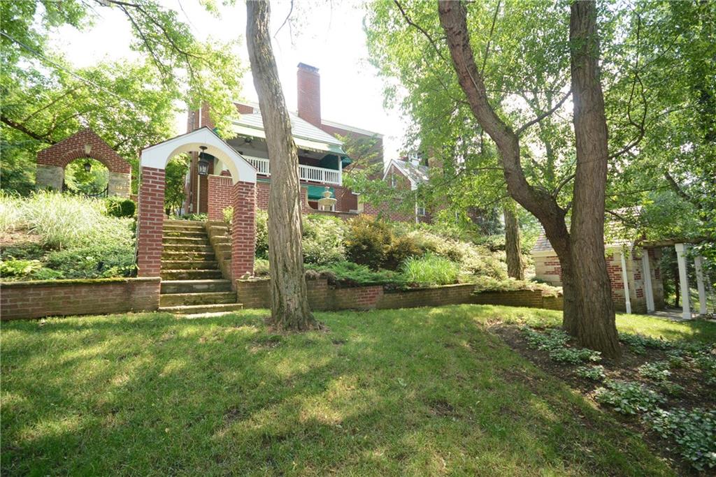 885 Old Hickory Road Mt. Lebanon, PA 15243 - Photo 25 of 25 The lower level of the lawn offers a brick garden shed with portico and a stone pathway with brick and stone archways. A colonial brick-surround wall borders the rear lawn where low-maintenance, deer-resistant perennial plantings add beauty and hemlocks provide year-round greenery and privacy.
