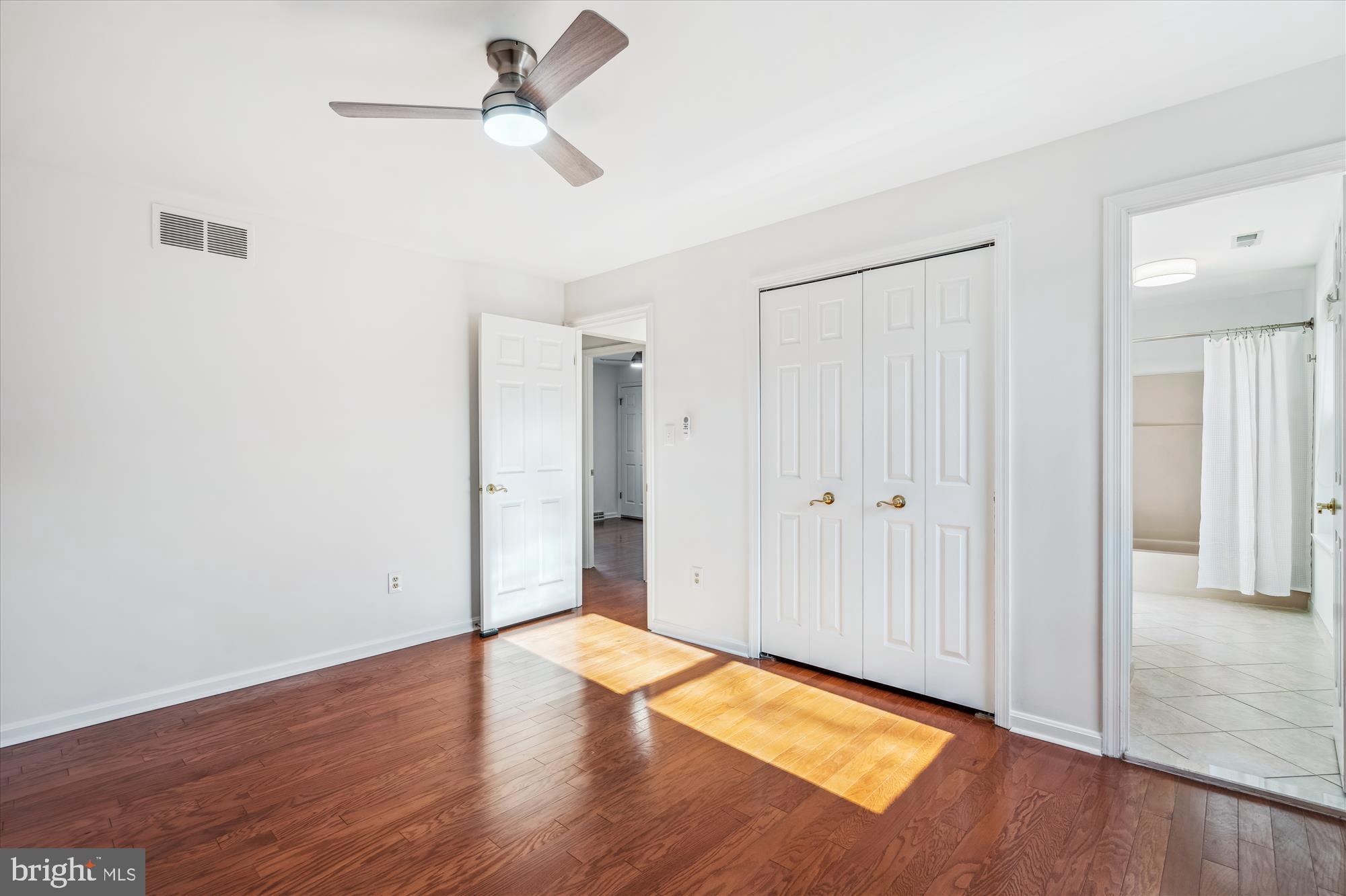 4048 Arjay Circle Ellicott City, MD 21042 - Photo 25 of 56 a view of empty room with wooden floor
