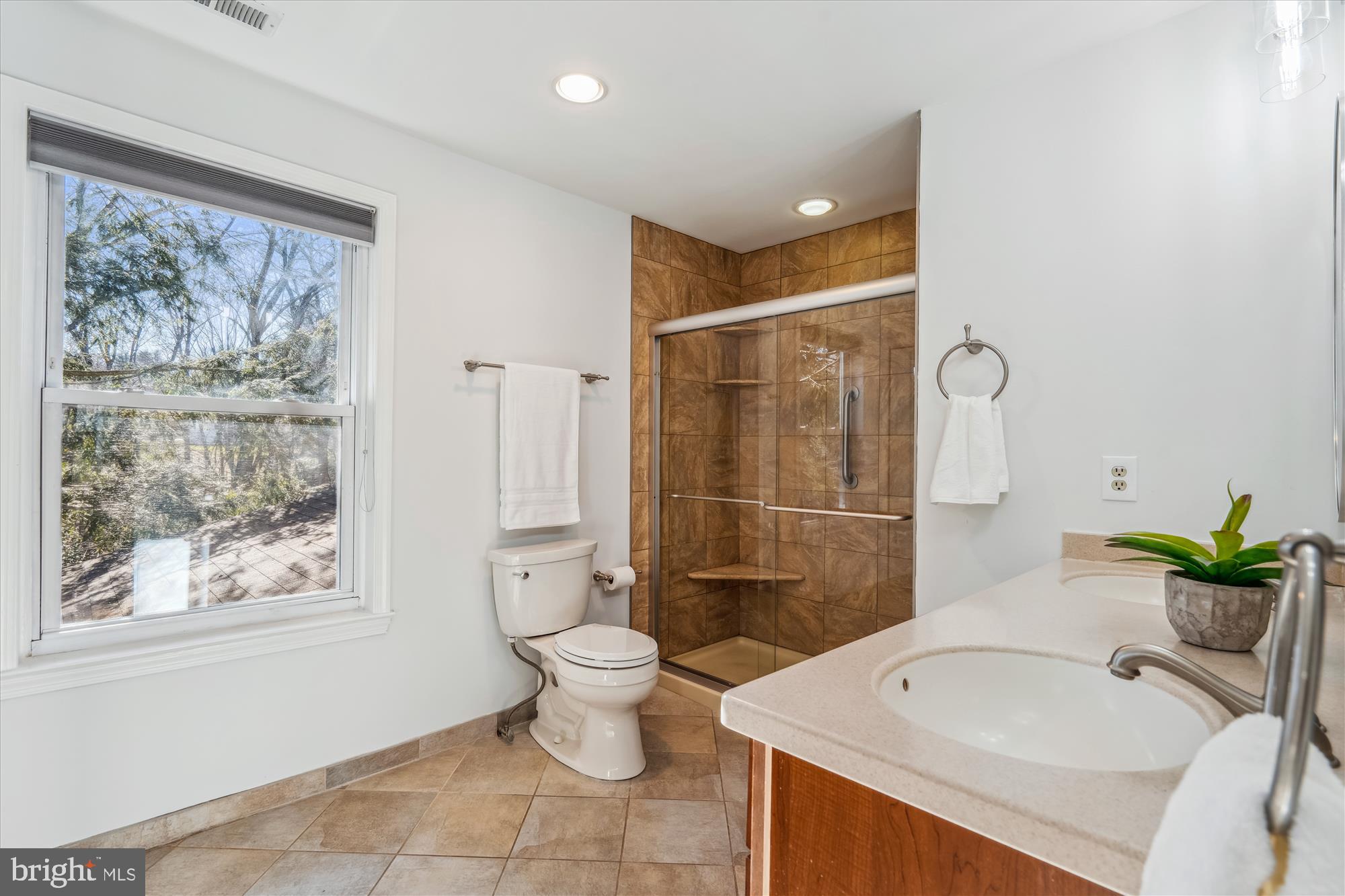 4048 Arjay Circle Ellicott City, MD 21042 - Photo 37 of 56 a bathroom with a sink toilet and shower