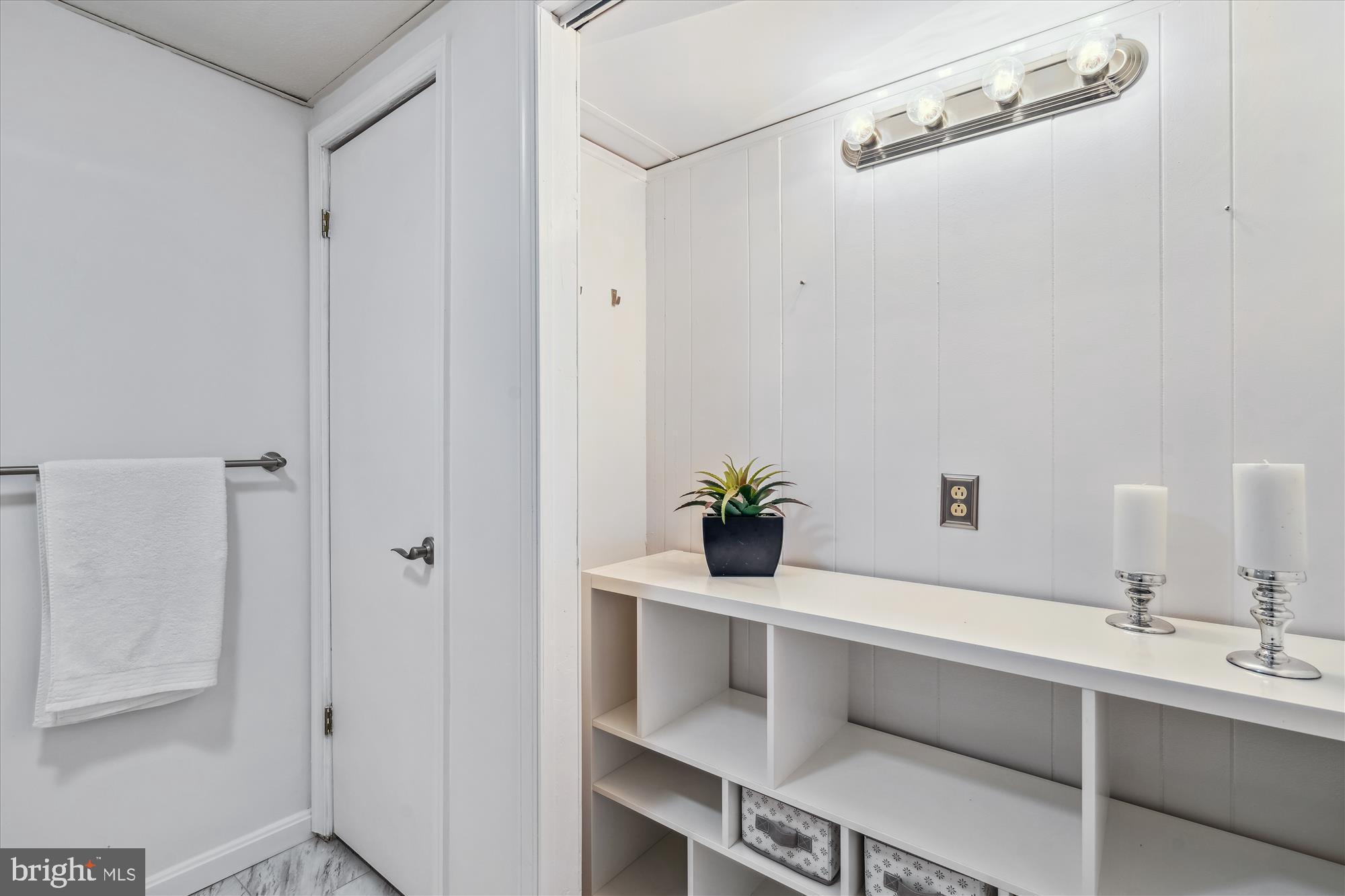 4048 Arjay Circle Ellicott City, MD 21042 - Photo 45 of 56 a bathroom with a sink and a mirror