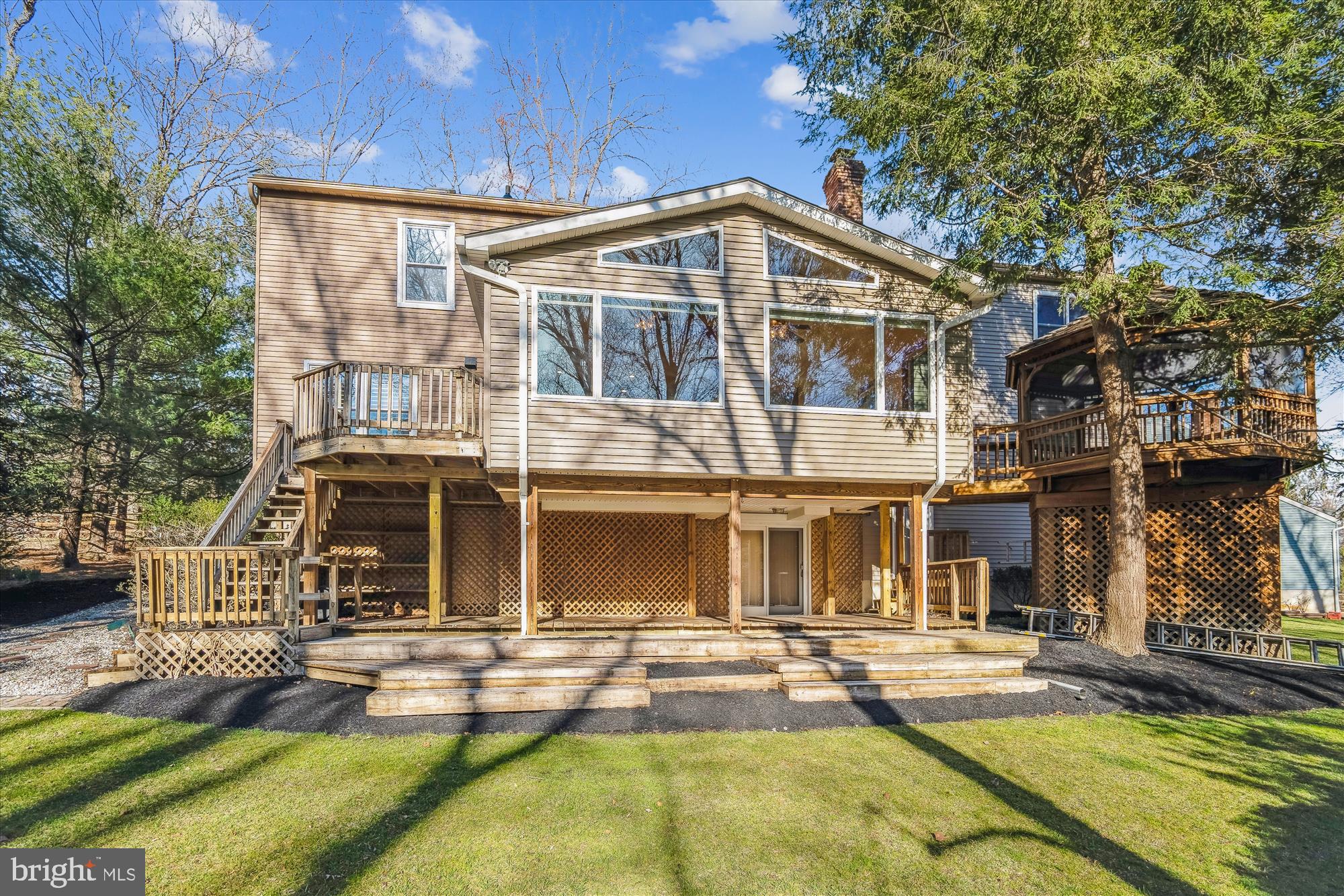 4048 Arjay Circle Ellicott City, MD 21042 - Photo 50 of 56 a front view of a house with swimming pool