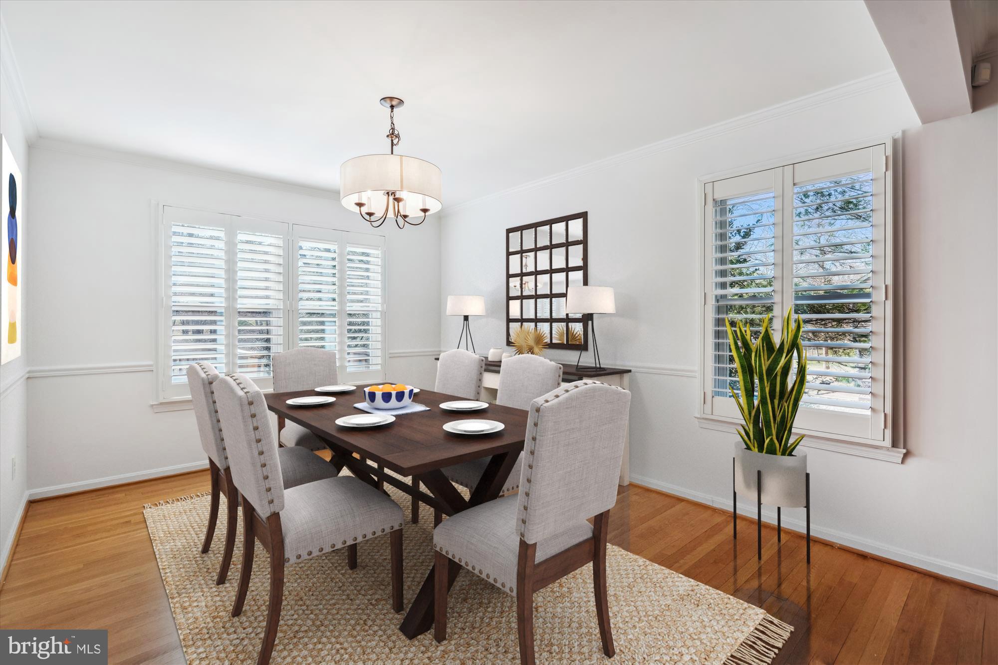 4048 Arjay Circle Ellicott City, MD 21042 - Photo 6 of 56 a dining room with furniture potted plants and wooden floor