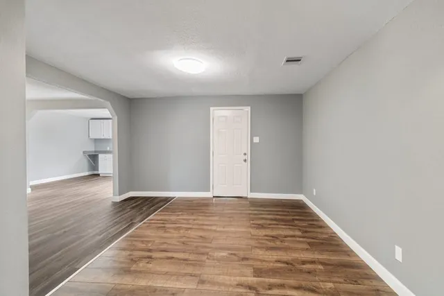 a view of an empty room and window