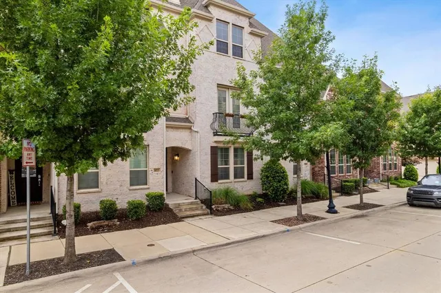 a view of a building with a garden