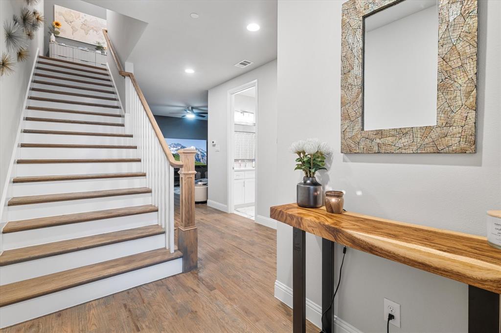 6013 Page Street Frisco, TX 75034 - Photo 6 of 38 a view of entryway and hall with wooden floor
